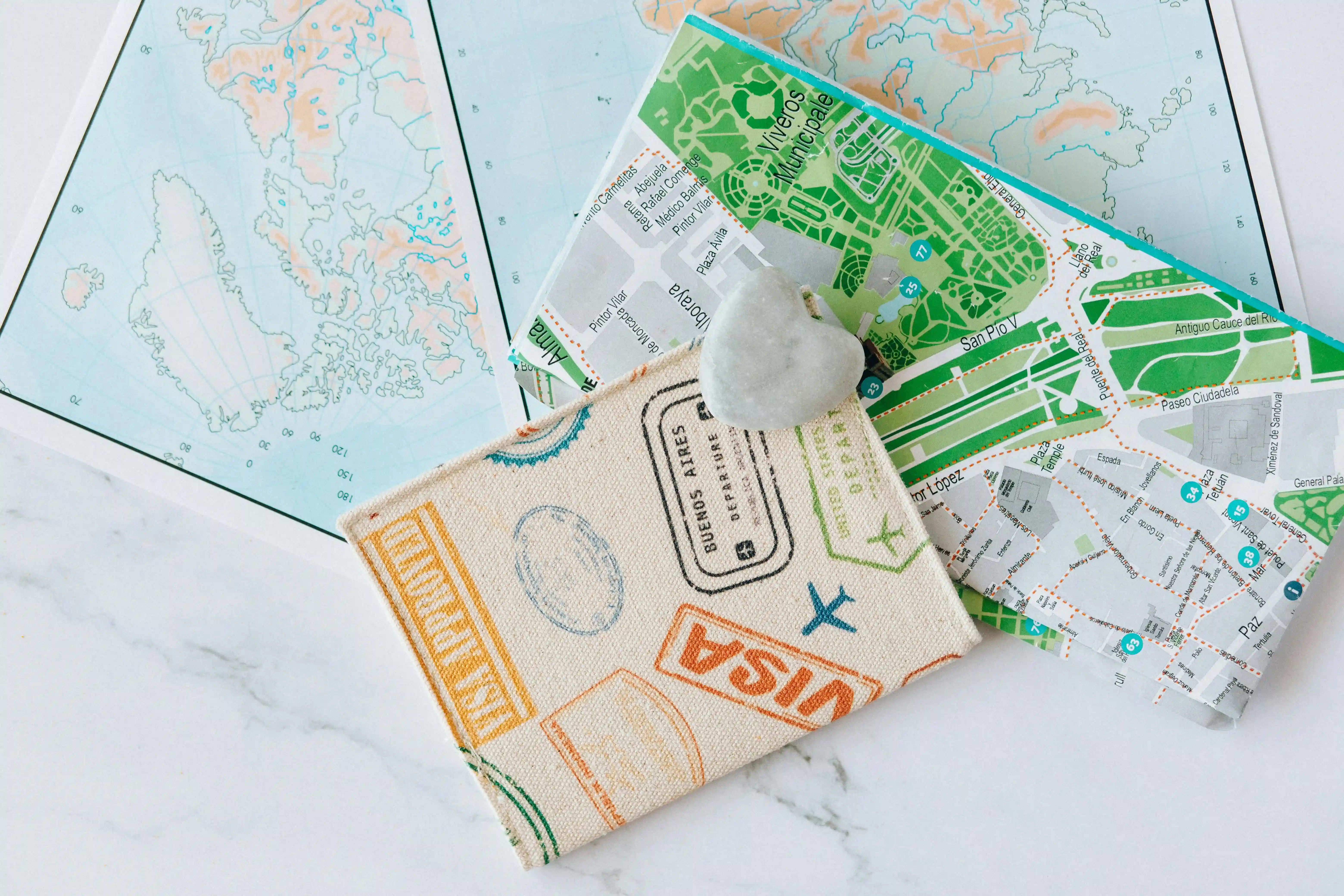 travel wallet and city maps